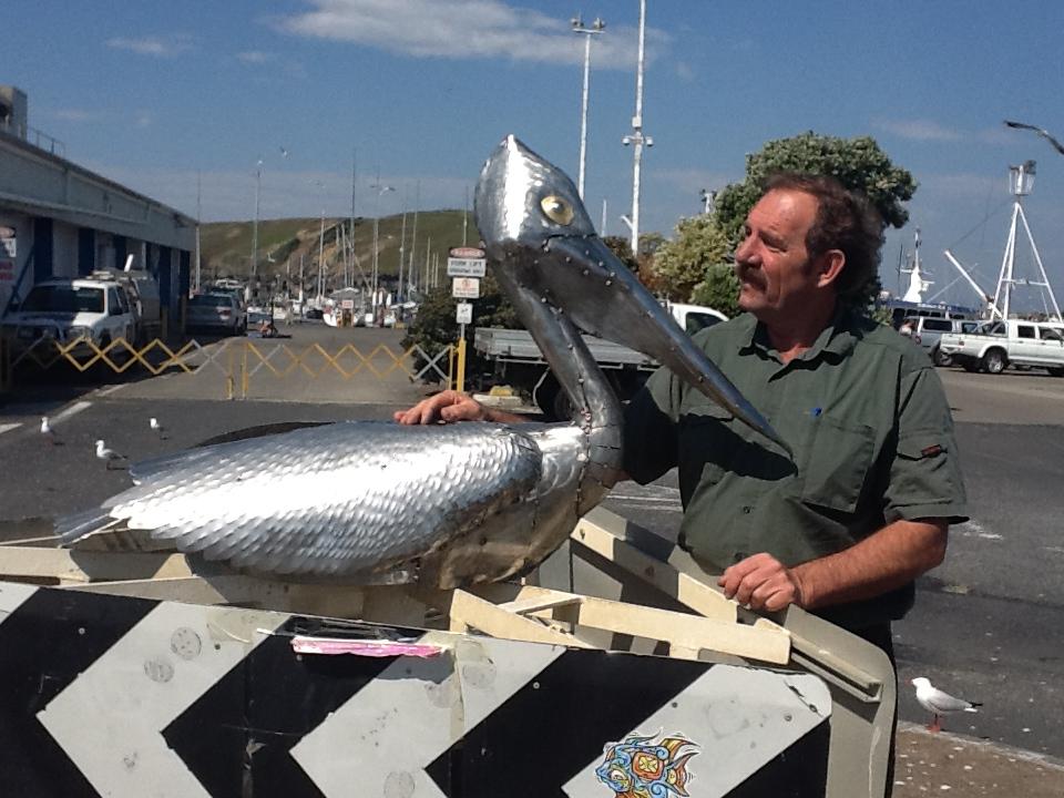 Pelican. Stainless steel sculpture at Emerald Beach Studio